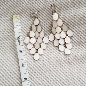 Express white and gold earrings